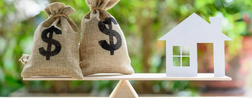 Scales balanced with money bags on each side, representing the decision between letting the bank use your home equity or using it to build personal wealth and retire sooner.